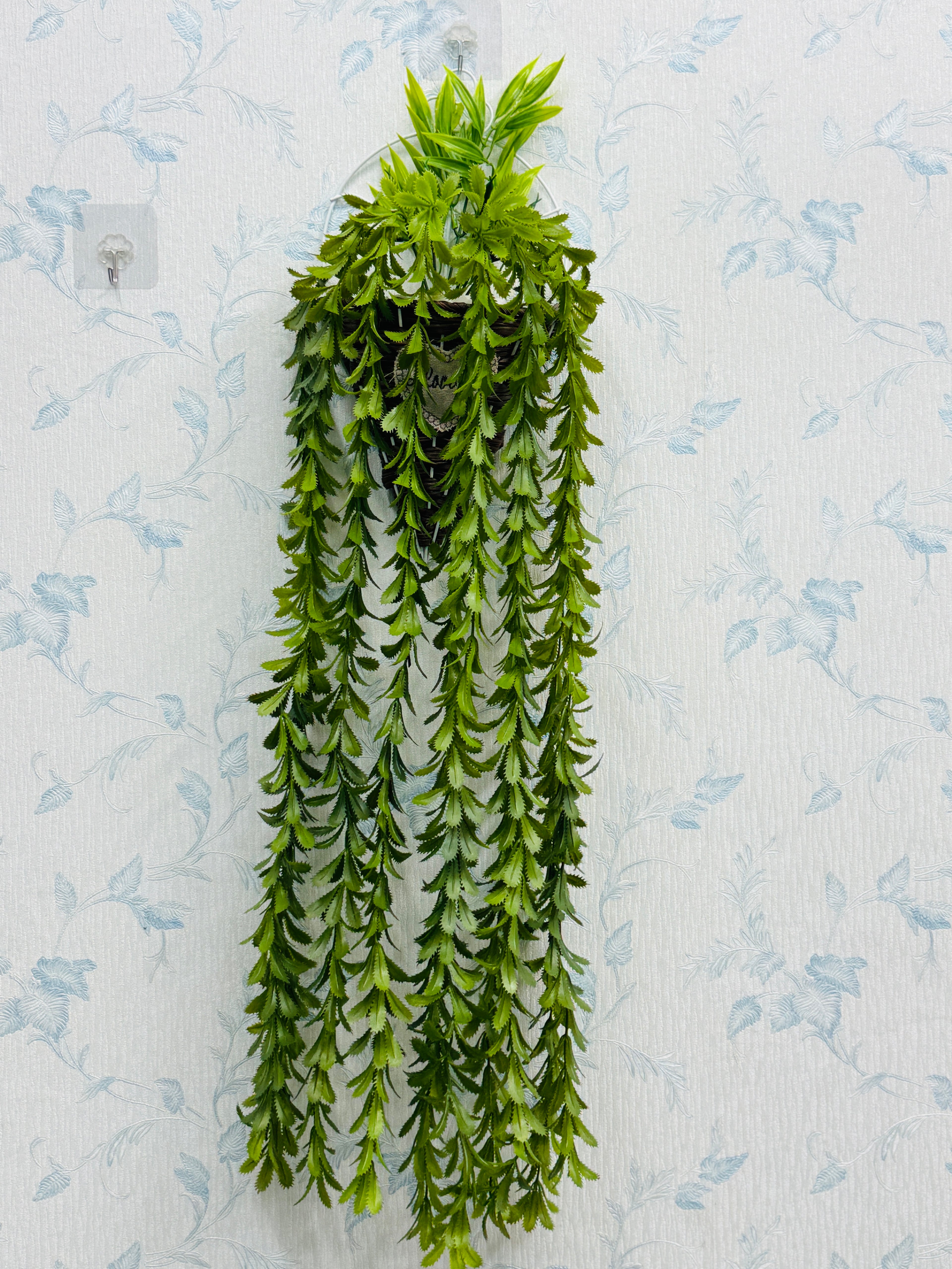 rubber Lota with metal wall planter