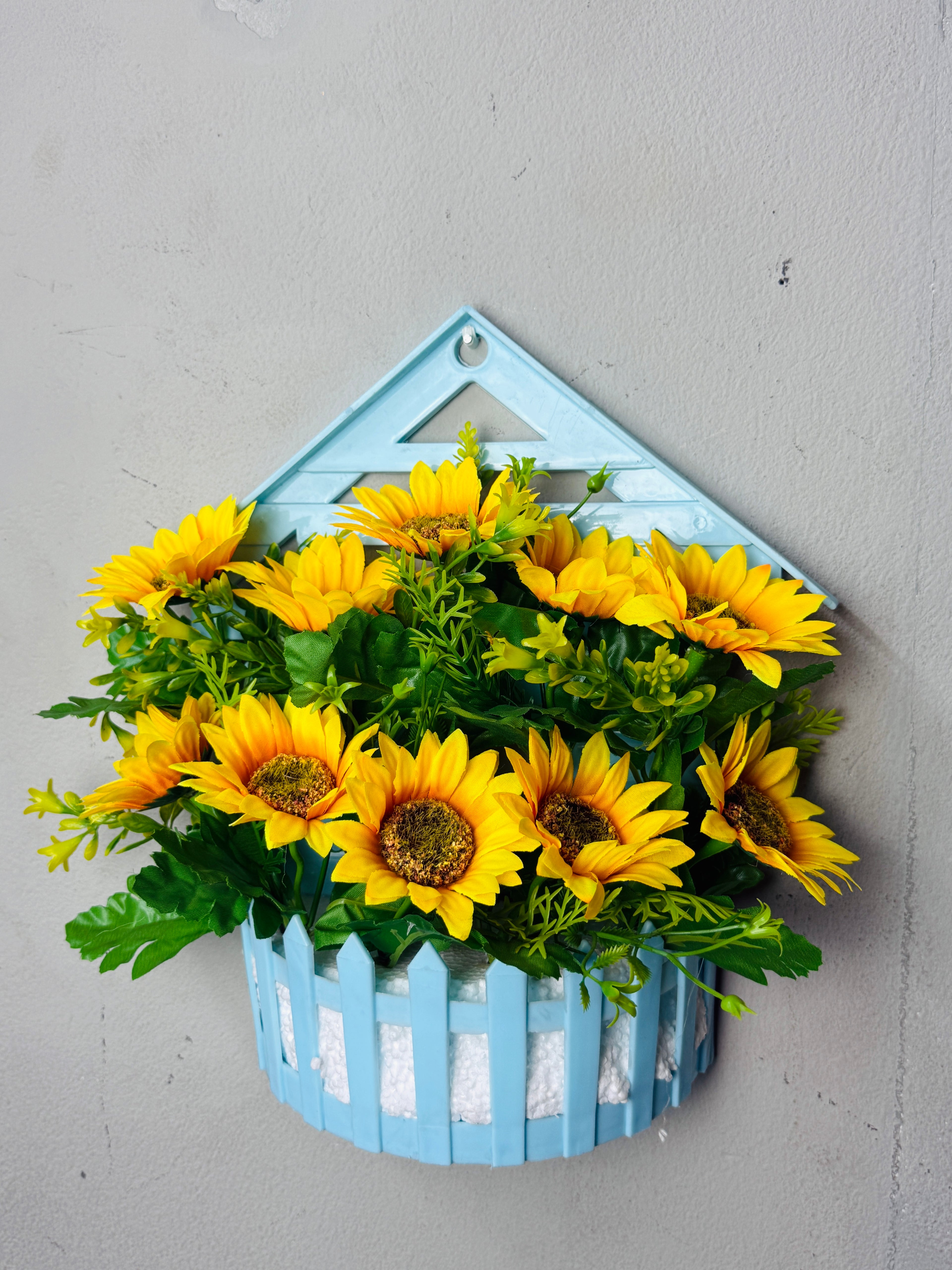 wall planter with artificial flowers setup