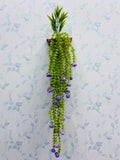 rubber Lota with metal wall planter