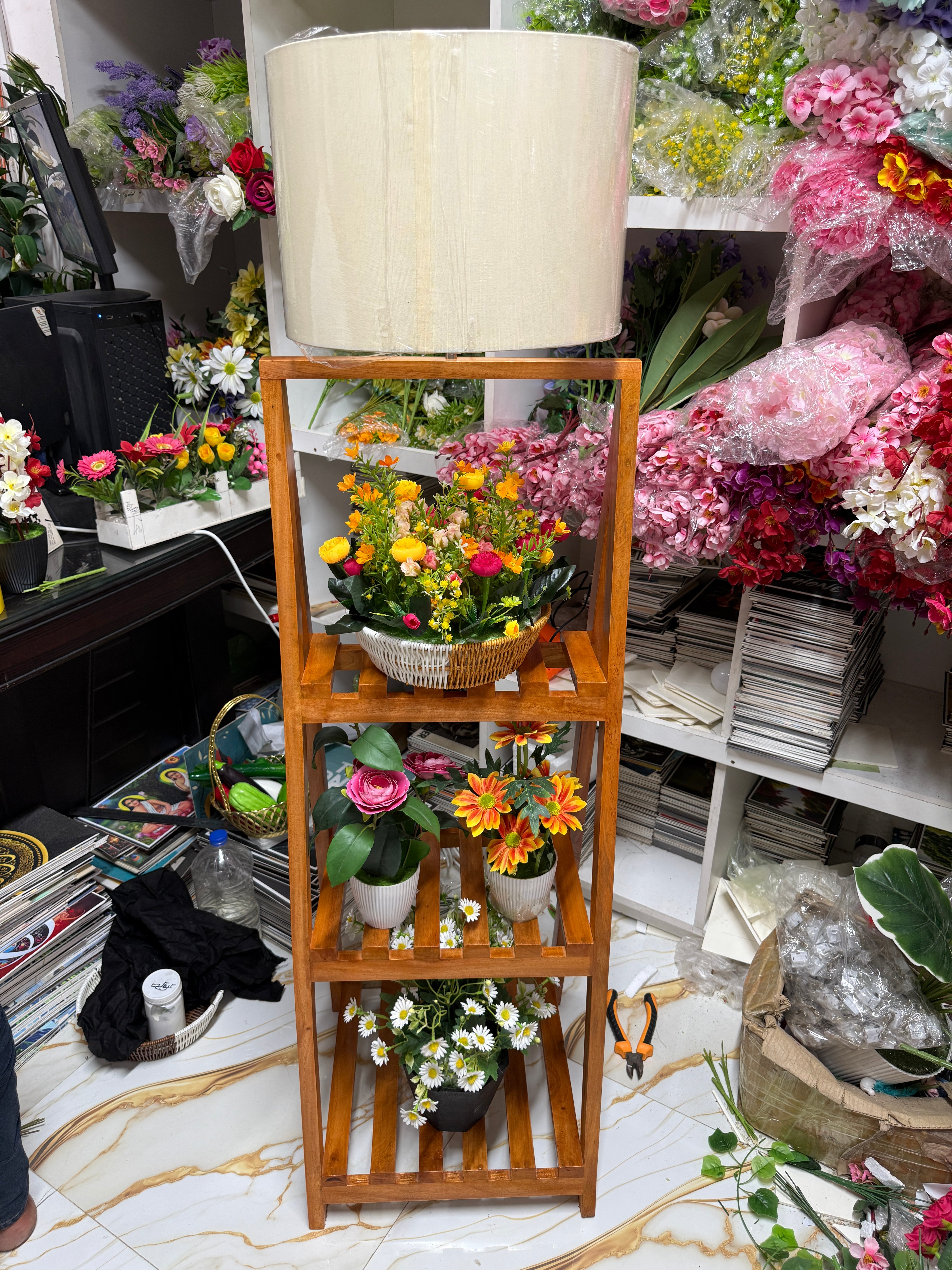 Corner stand with lampshade and flowers setup. 4 feet. mehegoni kath diye banano.