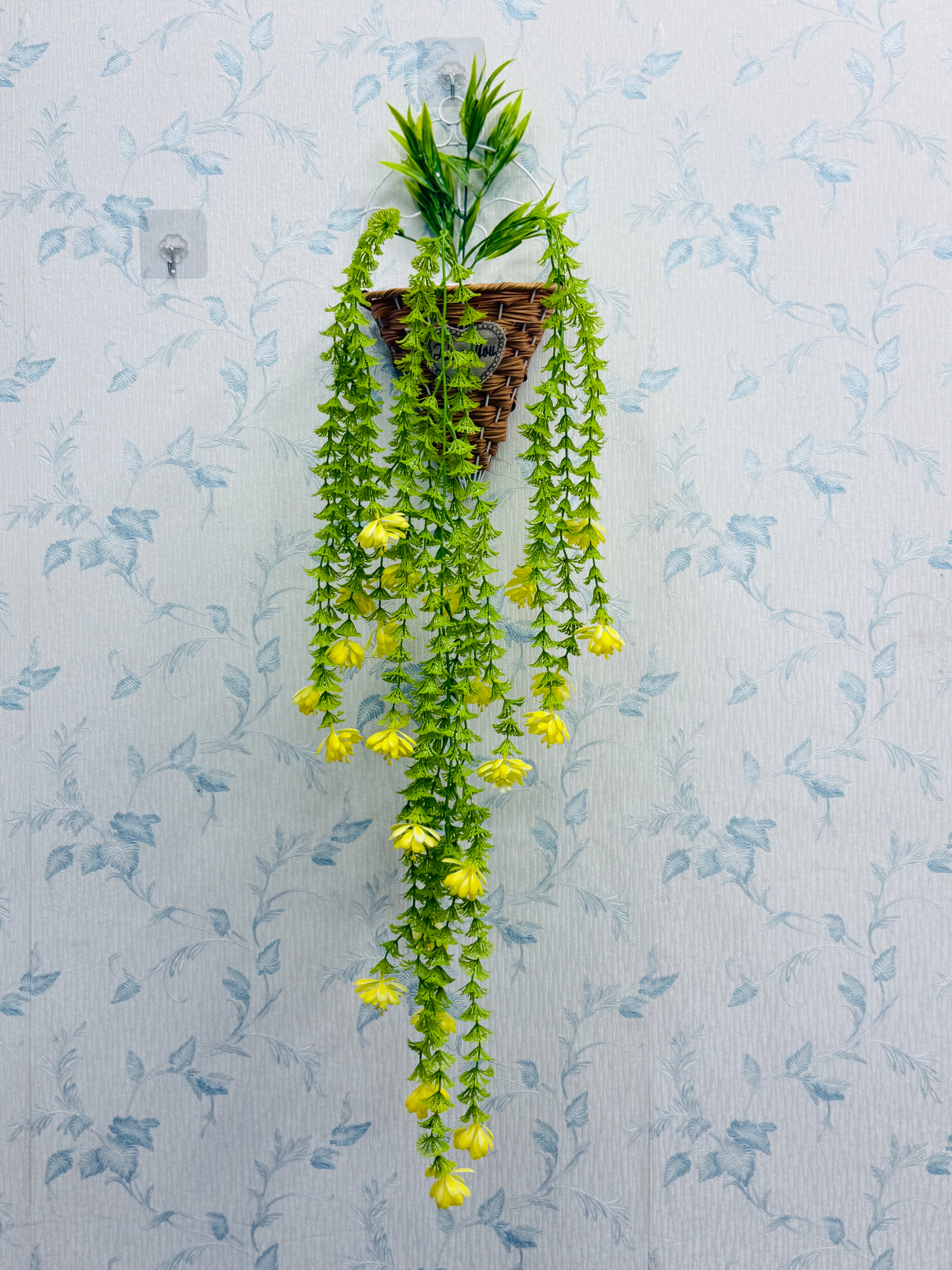 rubber Lota with metal wall planter