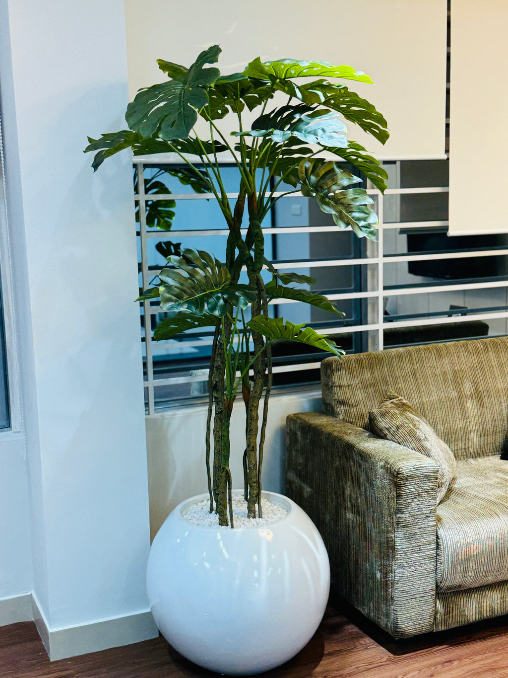premium quality chinese imported artificial moonstera plant with lulxurious round planter and stone 6 feet+