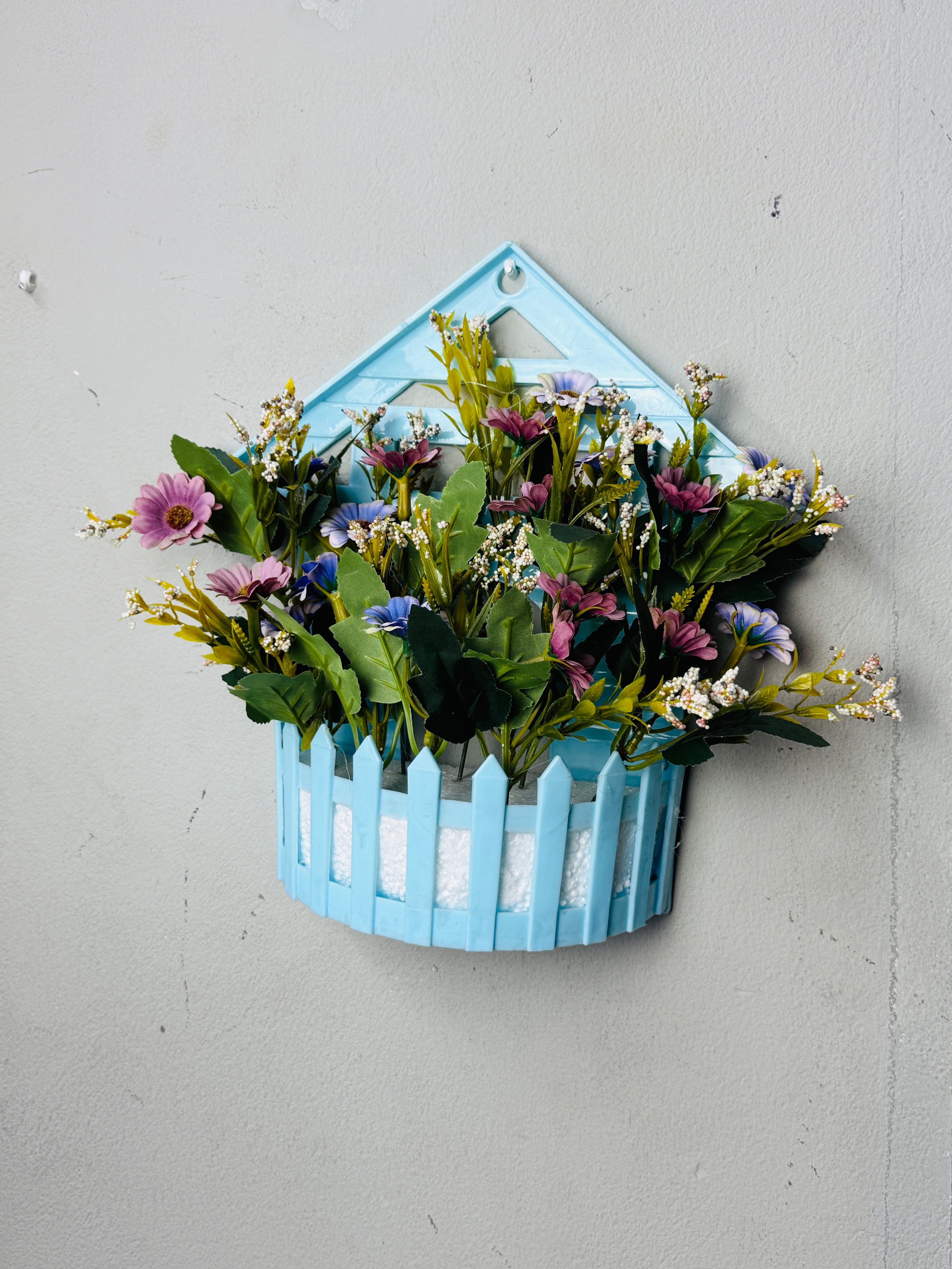 wall planter with artificial flowers setup