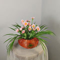 flowers arrangement with fiber bira planter