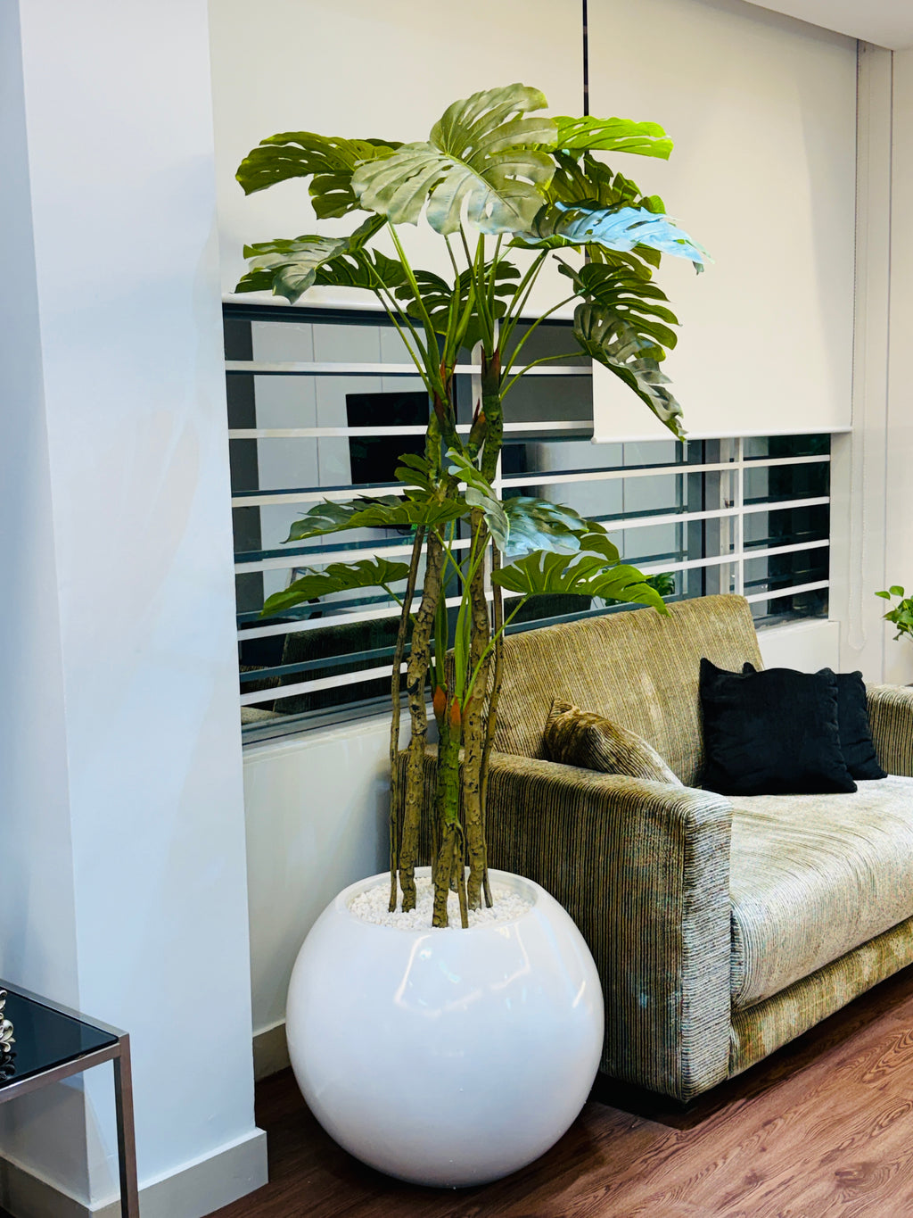 premium quality chinese imported artificial moonstera plant with lulxurious round planter and stone 6 feet+